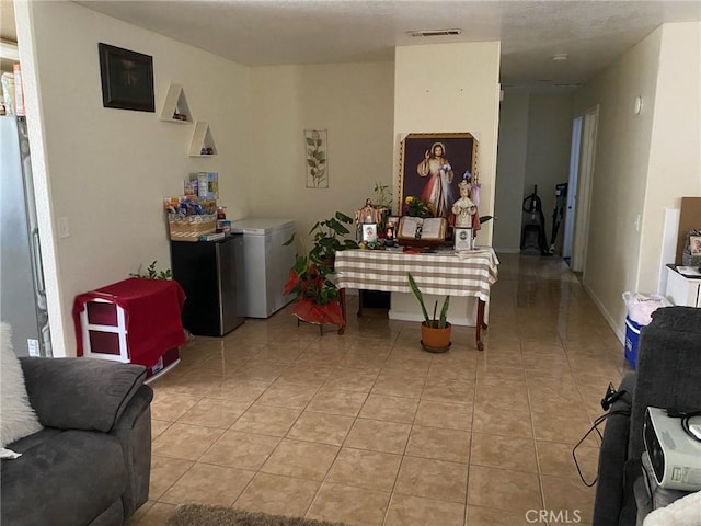 755 N Allen St, Banning, CA 92220 - living room featuring light tile patterned floors