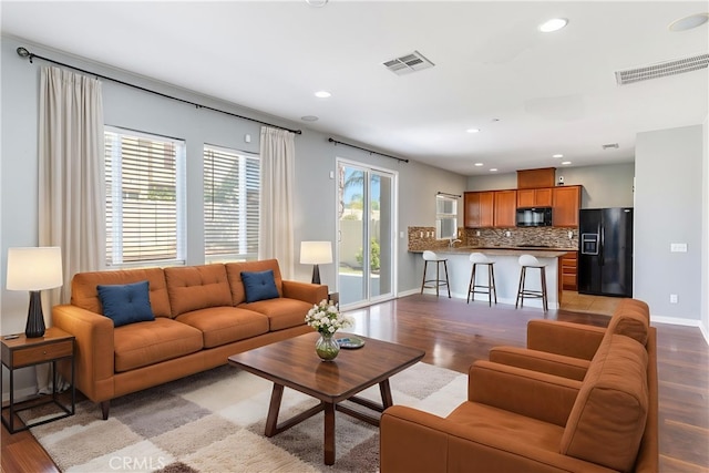 43024 Beamer Ct, Temecula, CA 92592 - living area with wood finished floors and recessed lighting