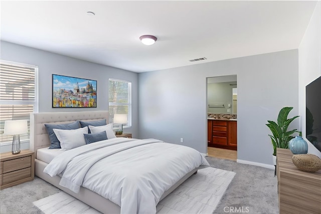 43024 Beamer Ct, Temecula, CA 92592 - bedroom featuring light carpet and connected bathroom
