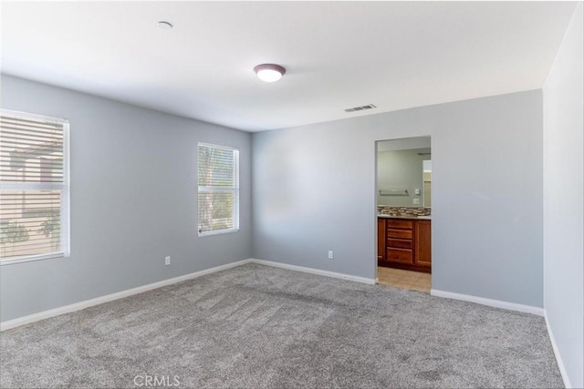43024 Beamer Ct, Temecula, CA 92592 - unfurnished room featuring light colored carpet