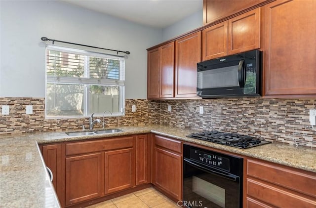 43024 Beamer Ct, Temecula, CA 92592 - kitchen featuring black appliances, tasteful backsplash, and brown cabinetry