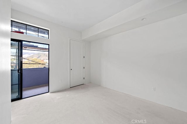581 Higuera St Unit 210, San Luis Obispo, CA 93401 - spare room featuring healthy amount of natural light and concrete floors