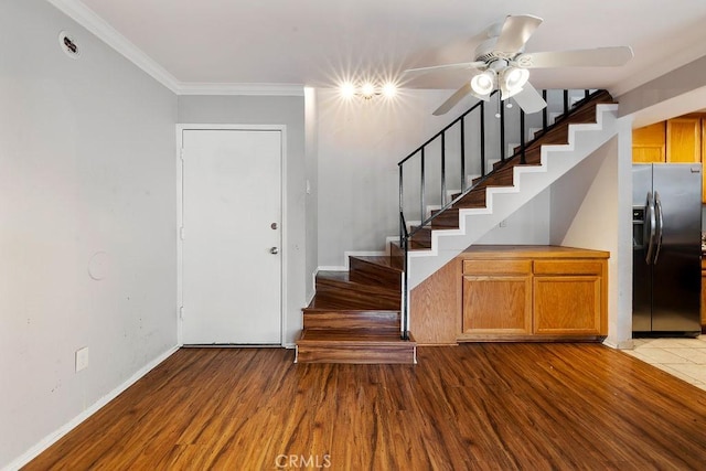5325 Newcastle Ave Unit 319, Encino, CA 91316 - stairs featuring wood finished floors, ceiling fan, and crown molding