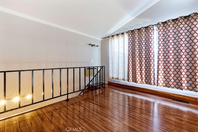 5325 Newcastle Ave Unit 319, Encino, CA 91316 - staircase featuring ornamental molding, lofted ceiling, and wood finished floors