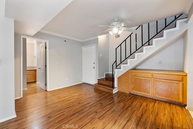 5325 Newcastle Ave Unit 319, Encino, CA 91316 - unfurnished living room featuring light wood finished floors, stairway, a ceiling fan, and ornamental molding