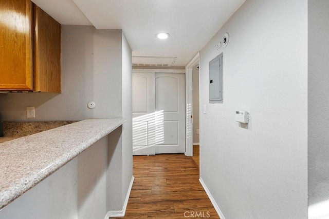 5325 Newcastle Ave Unit 319, Encino, CA 91316 - corridor with dark wood finished floors, electric panel, and recessed lighting