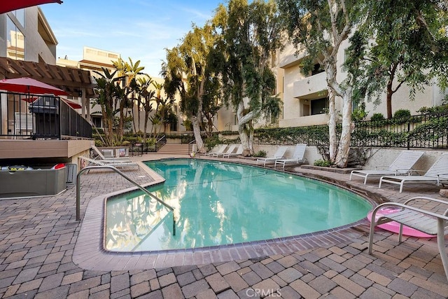 5325 Newcastle Ave Unit 319, Encino, CA 91316 - community pool featuring a patio area