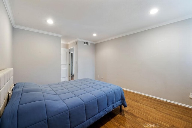 5325 Newcastle Ave Unit 319, Encino, CA 91316 - bedroom with wood finished floors, recessed lighting, crown molding, and radiator