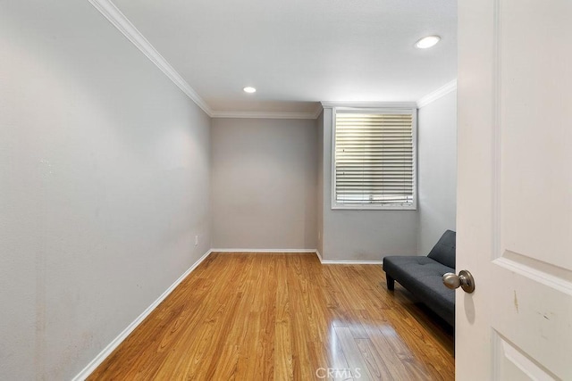 5325 Newcastle Ave Unit 319, Encino, CA 91316 - unfurnished room with ornamental molding, light wood finished floors, and recessed lighting