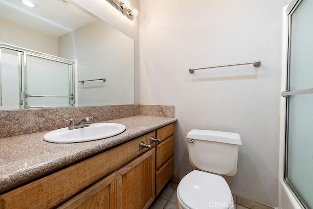 5325 Newcastle Ave Unit 319, Encino, CA 91316 - full bathroom with vanity, a shower with door, and tile patterned flooring