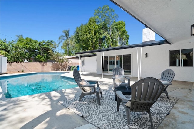 4701 Deseret Dr, Woodland Hills, CA 91364 - view of swimming pool featuring a fenced backyard and a patio