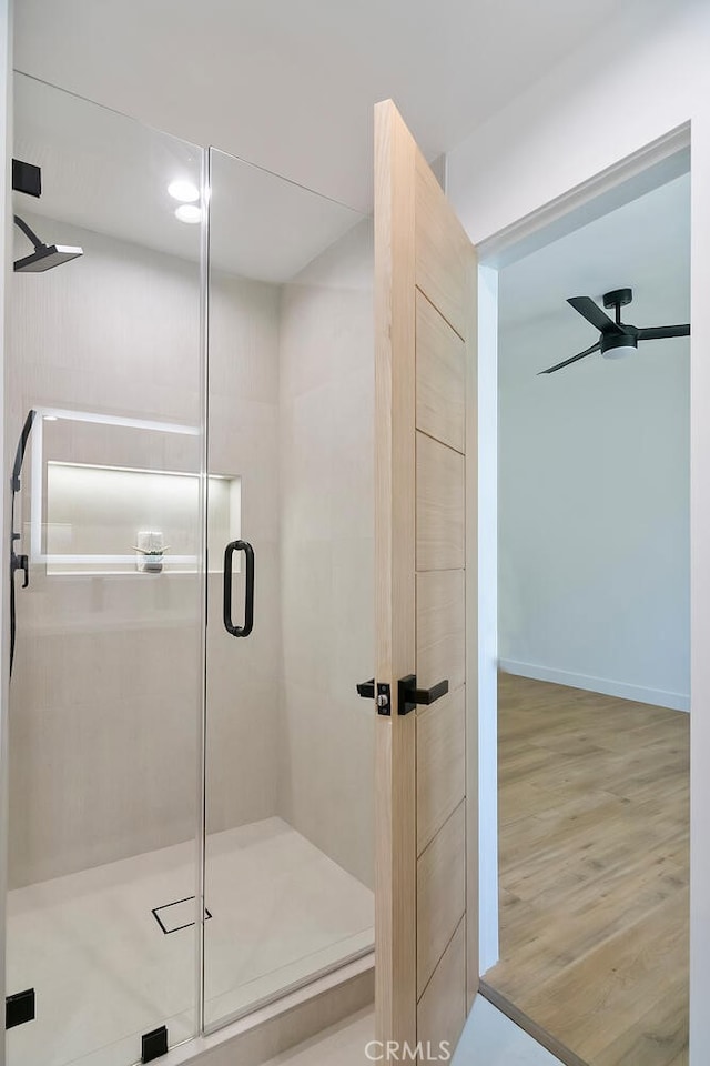 4701 Deseret Dr, Woodland Hills, CA 91364 - bathroom featuring a shower stall, wood finished floors, and a ceiling fan