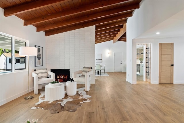 4701 Deseret Dr, Woodland Hills, CA 91364 - living area featuring wood ceiling, wood finished floors, and a fireplace