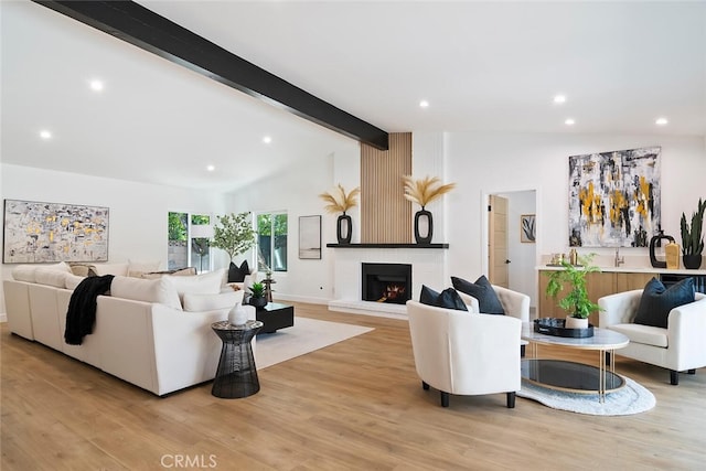 4701 Deseret Dr, Woodland Hills, CA 91364 - living room with light wood finished floors, recessed lighting, and a brick fireplace