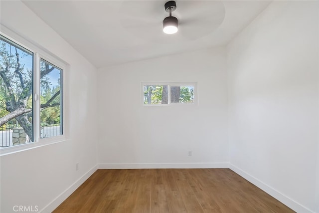 4701 Deseret Dr, Woodland Hills, CA 91364 - spare room with a ceiling fan, wood finished floors, and vaulted ceiling