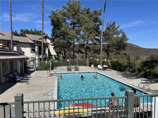 10824 Sabre Hill Dr Unit 194, San Diego, CA 92128 - community pool featuring a patio area and a mountain view