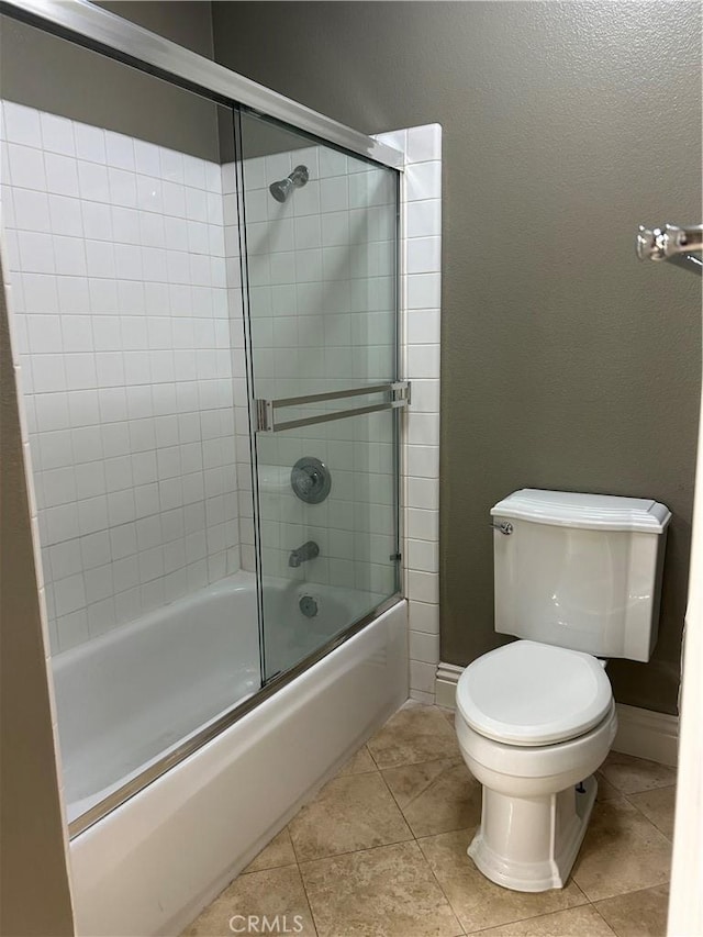 10824 Sabre Hill Dr Unit 194, San Diego, CA 92128 - bathroom with combined bath / shower with glass door and tile patterned floors