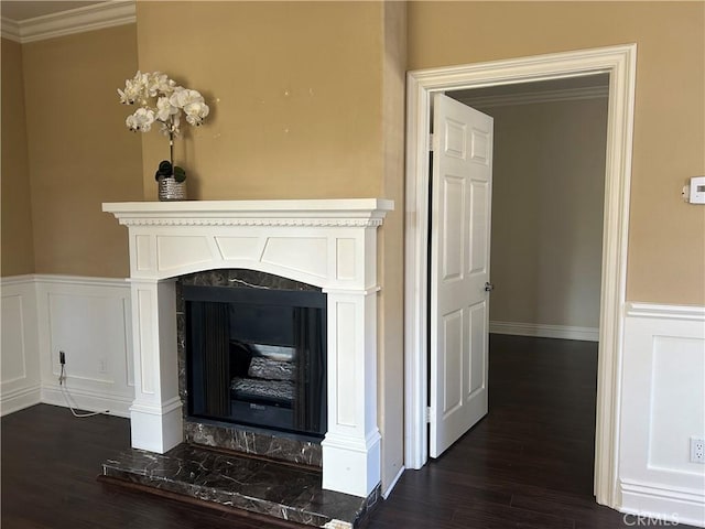 10824 Sabre Hill Dr Unit 194, San Diego, CA 92128 - detailed view of wood finished floors, a wainscoted wall, ornamental molding, and a high end fireplace