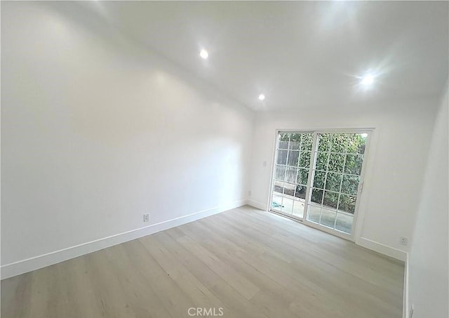 21541 Yucatan Ave, Woodland Hills, CA 91364 - unfurnished room featuring light wood-style flooring and recessed lighting