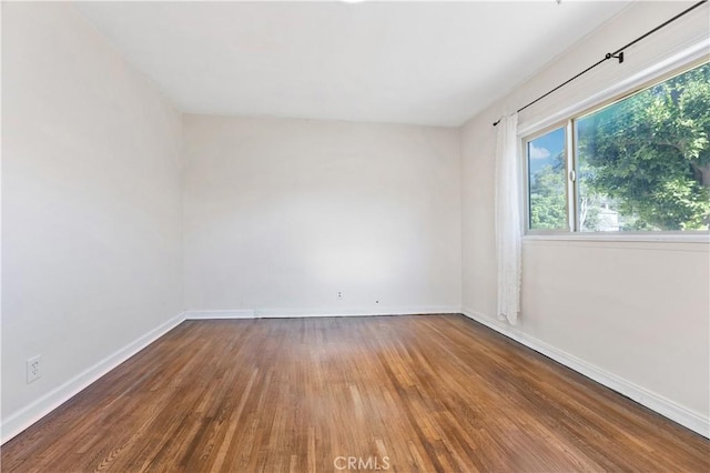 9720 Live Oak Ave, Temple City, CA 91780 - spare room featuring wood finished floors and baseboards