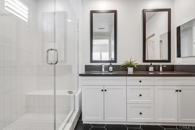 2013 Bravo Loop Unit 2, Chula Vista, CA 91915 - full bathroom featuring a shower stall and double vanity