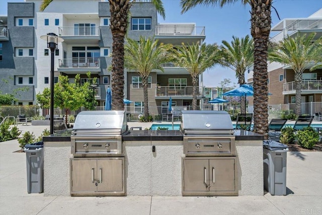 2013 Bravo Loop Unit 2, Chula Vista, CA 91915 - view of patio / terrace with an outdoor kitchen