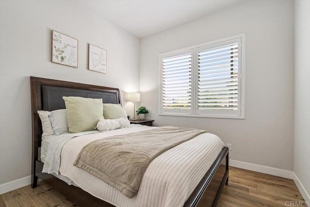 2013 Bravo Loop Unit 2, Chula Vista, CA 91915 - bedroom with baseboards and wood finished floors