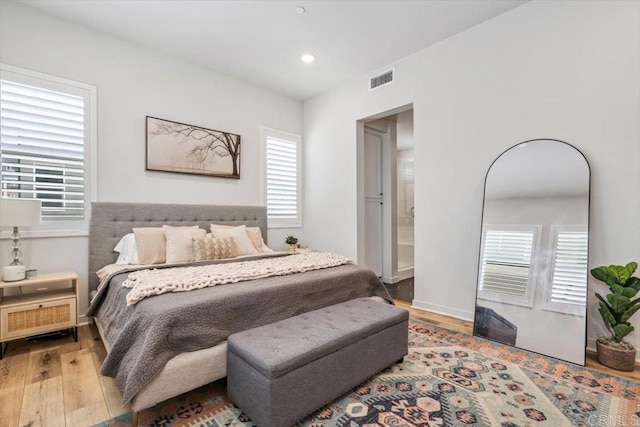 2013 Bravo Loop Unit 2, Chula Vista, CA 91915 - bedroom featuring wood finished floors, multiple windows, and recessed lighting