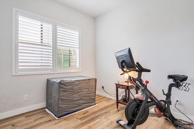 2013 Bravo Loop Unit 2, Chula Vista, CA 91915 - workout room featuring wood finished floors and baseboards
