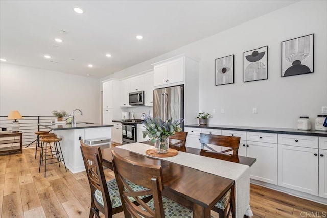 2013 Bravo Loop Unit 2, Chula Vista, CA 91915 - dining area featuring recessed lighting and light wood-type flooring