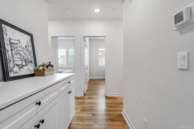 2013 Bravo Loop Unit 2, Chula Vista, CA 91915 - corridor with light wood finished floors and recessed lighting