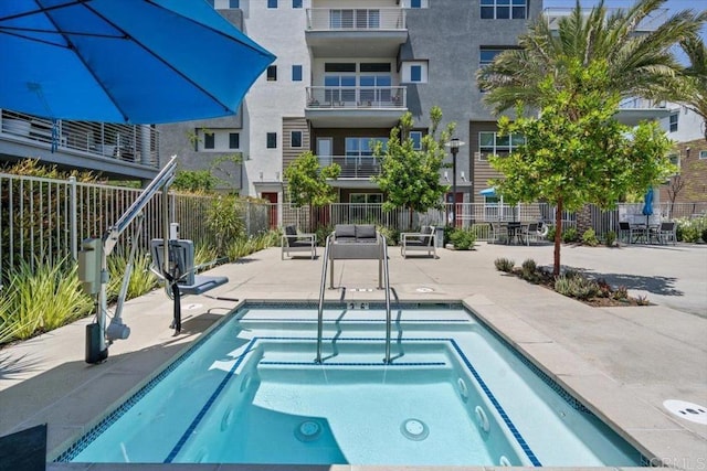 2013 Bravo Loop Unit 2, Chula Vista, CA 91915 - view of pool featuring a swimming pool, a hot tub, and a patio