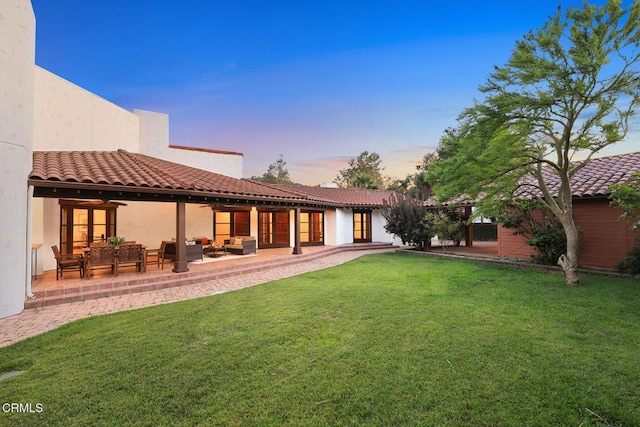 1533 Rancho Ave, Glendale, CA 91201 - back of property featuring outdoor lounge area, a yard, a patio area, and a tiled roof