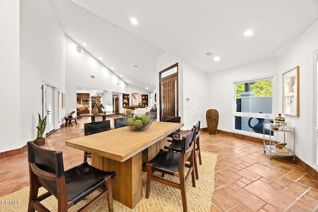 1533 Rancho Ave, Glendale, CA 91201 - dining room featuring lofted ceiling, recessed lighting, and stone tile floors