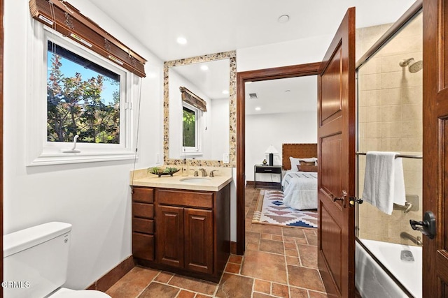 1533 Rancho Ave, Glendale, CA 91201 - bathroom with vanity, ensuite bathroom, washtub / shower combination, recessed lighting, and stone tile flooring