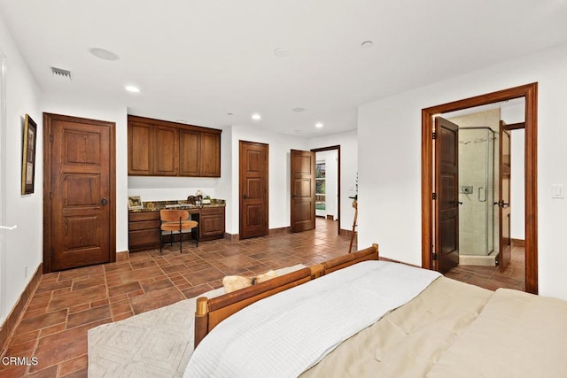 1533 Rancho Ave, Glendale, CA 91201 - bedroom with built in desk, recessed lighting, and dark stone finish floors