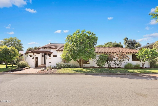 1533 Rancho Ave, Glendale, CA 91201 - mediterranean / spanish house with stucco siding and a tile roof