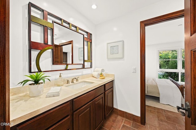 1533 Rancho Ave, Glendale, CA 91201 - bathroom with vanity, ensuite bath, stone finish floors, and recessed lighting