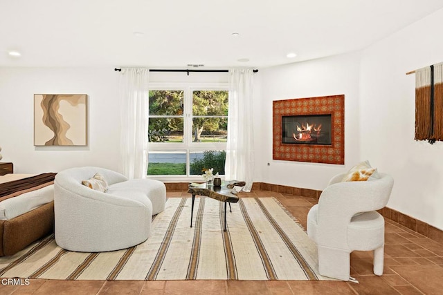 1533 Rancho Ave, Glendale, CA 91201 - living room with a glass covered fireplace, recessed lighting, and tile patterned flooring