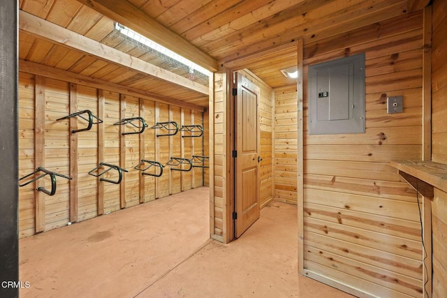 1533 Rancho Ave, Glendale, CA 91201 - hallway with electric panel, wooden walls, wooden ceiling, and concrete floors