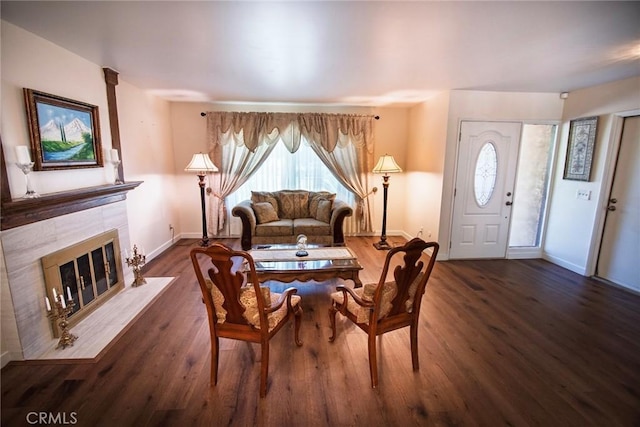 20716 Community St, Winnetka, CA 91306 - living room with wood finished floors, plenty of natural light, and a fireplace