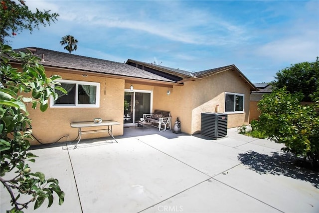 20716 Community St, Winnetka, CA 91306 - back of house with stucco siding and a patio area