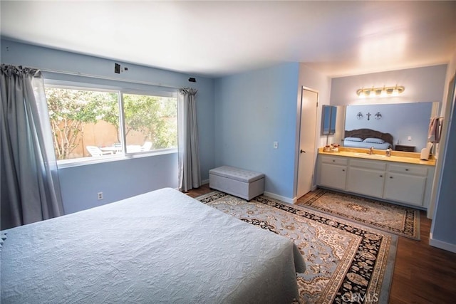 20716 Community St, Winnetka, CA 91306 - bedroom with wood finished floors and ensuite bath