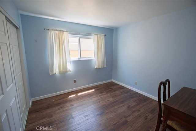 20716 Community St, Winnetka, CA 91306 - unfurnished bedroom featuring dark wood finished floors and a closet