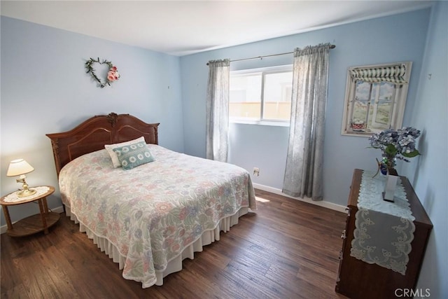 20716 Community St, Winnetka, CA 91306 - bedroom featuring dark wood-style flooring and baseboards