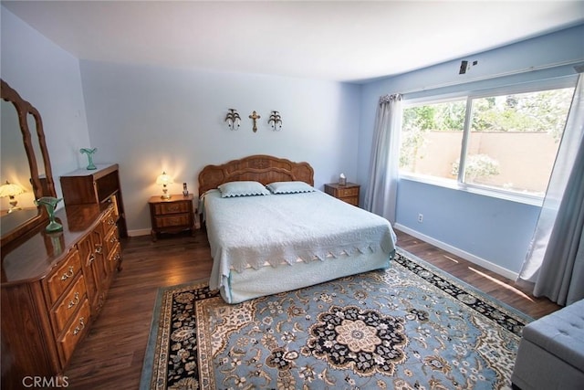 20716 Community St, Winnetka, CA 91306 - bedroom featuring dark wood-style flooring