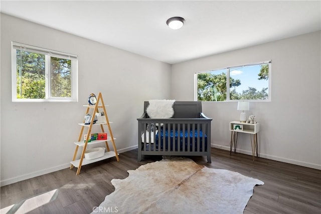 5155 Ardilla Ave, Atascadero, CA 93422 - bedroom with multiple windows and wood finished floors