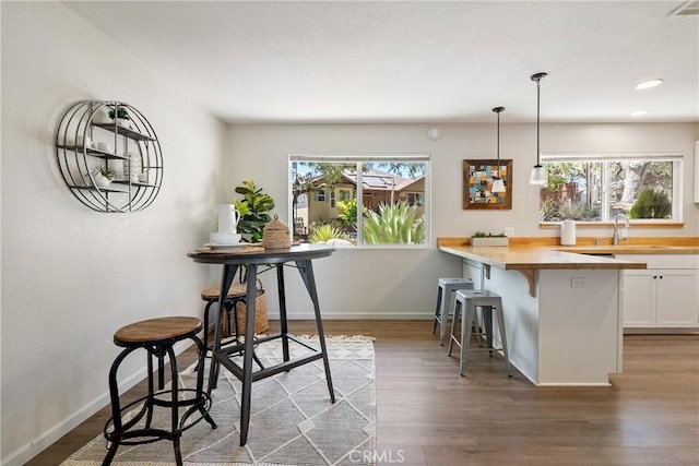 5155 Ardilla Ave, Atascadero, CA 93422 - dining room featuring wood finished floors and recessed lighting