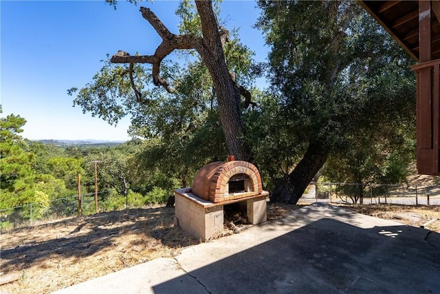 5155 Ardilla Ave, Atascadero, CA 93422 - view of patio featuring a wooded view