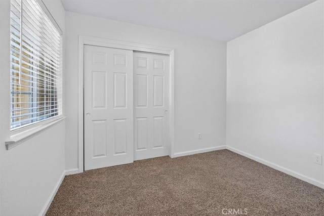 4729 Lookout Mountain Rd, Mariposa, CA 95338 - unfurnished bedroom featuring carpet flooring and a closet